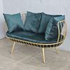 Ghế sofa khung sắt tròn vàng đồng nệm xanh GSD68056